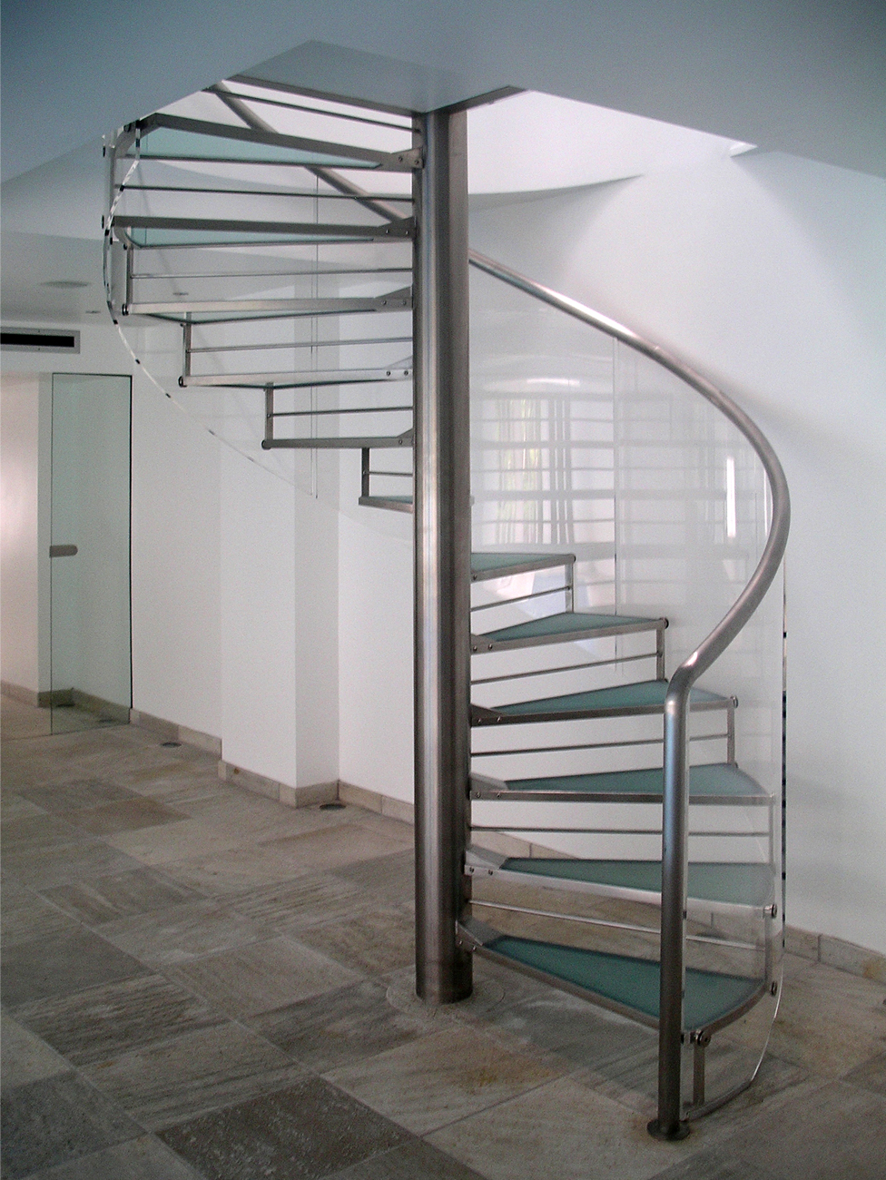 Stone treads with clever lighting to highlight the finer details.