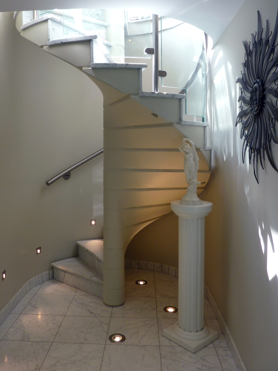 Stone treads with clever lighting to highlight the finer details.